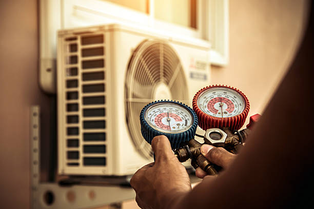 Professional Heat Pump Repair technician working in Germantown, OH